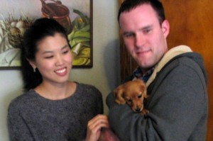 Jennifer Tam and Max Lewis with their new puppy